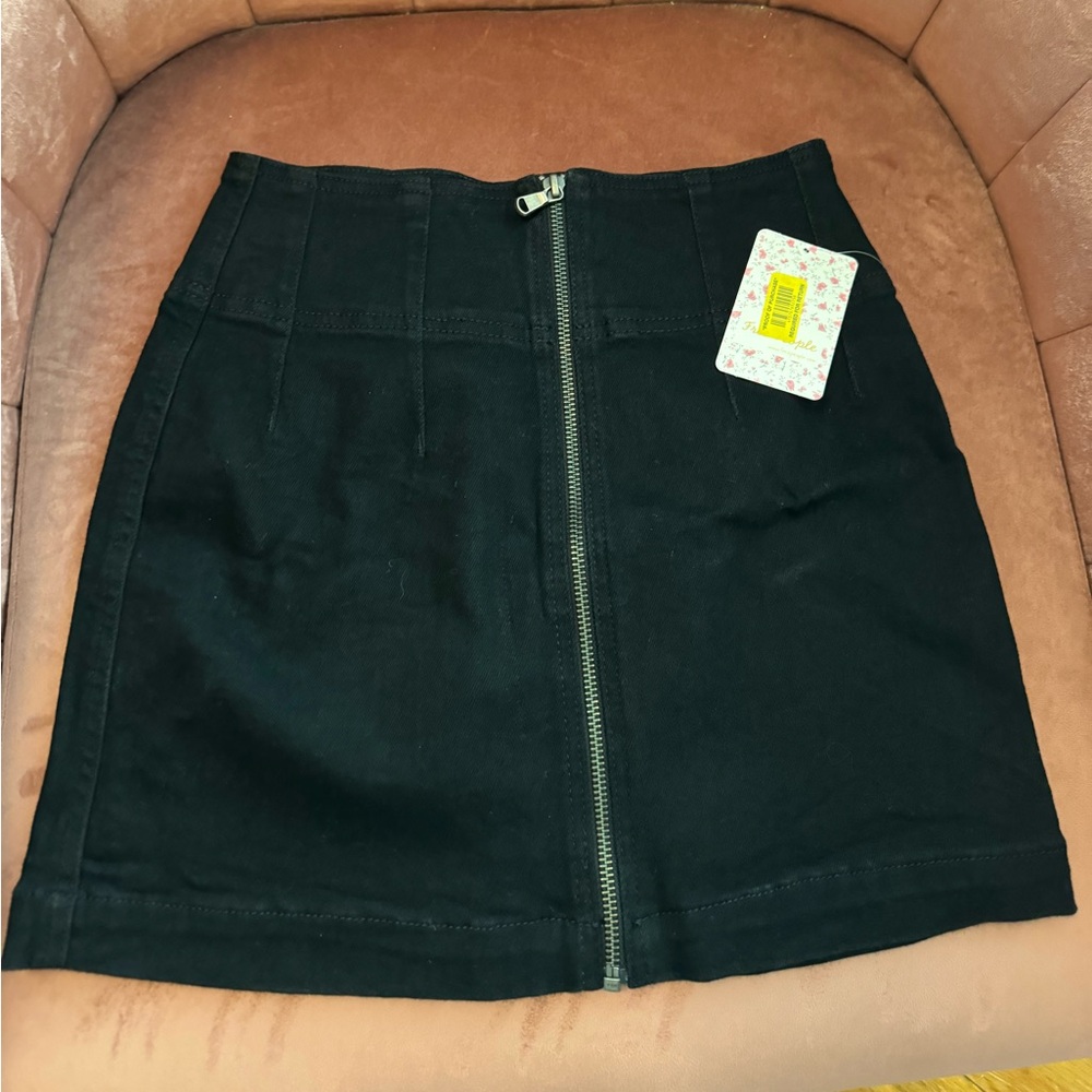 Free people full zip black denim skirt. Size 26. New with tags